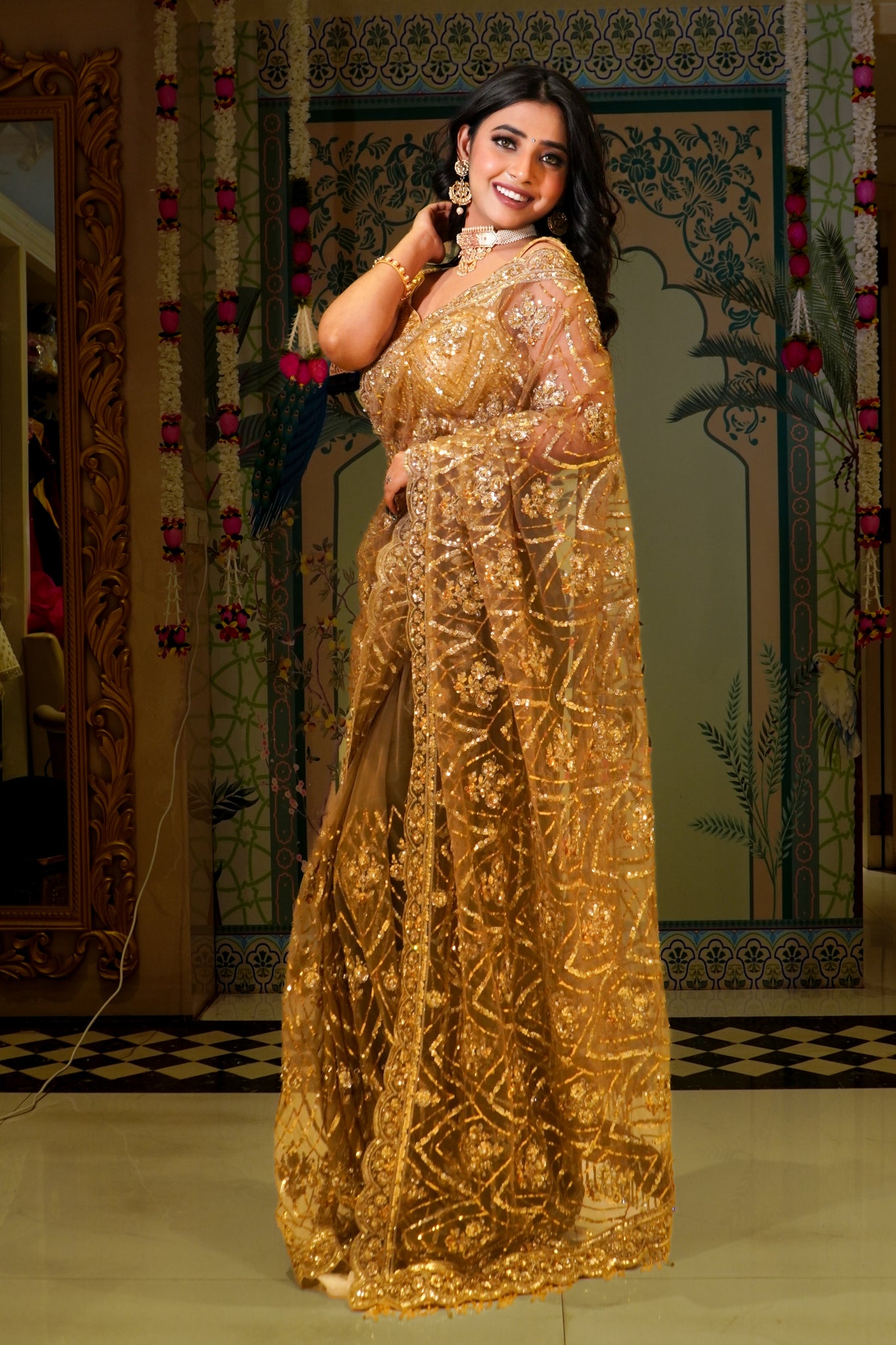 TERESA-GOLDEN - Embroidered Designer Net Saree with stitched Blouse .