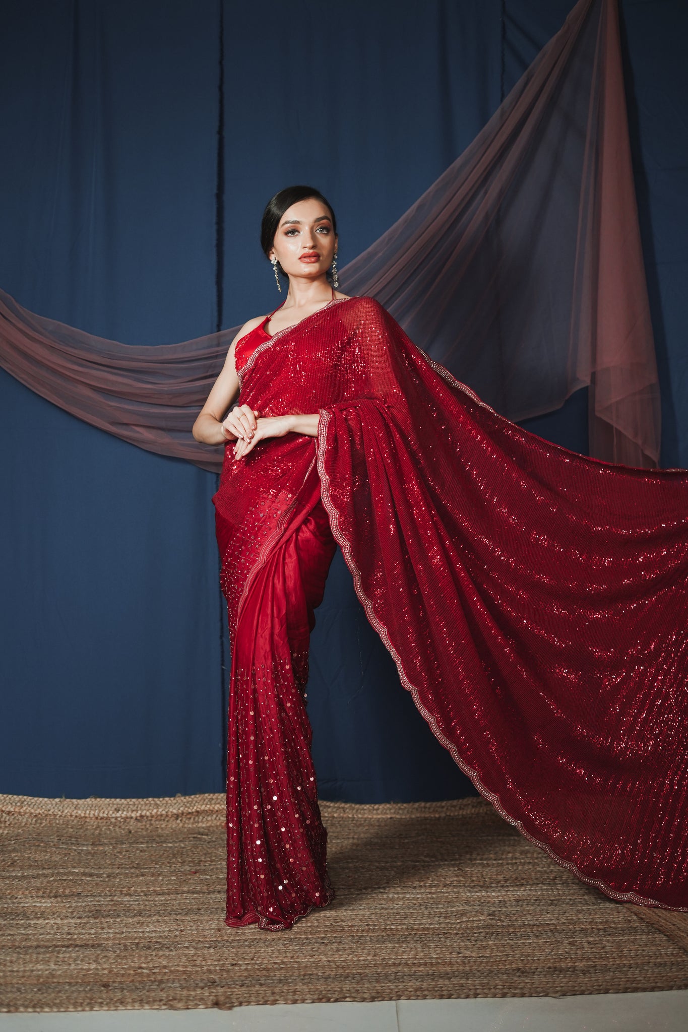 Carina- Maroon Net Saree  With Embrodered Blouse.