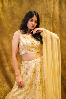Ella- Gold lehenga with matching Blouse and Dupatta