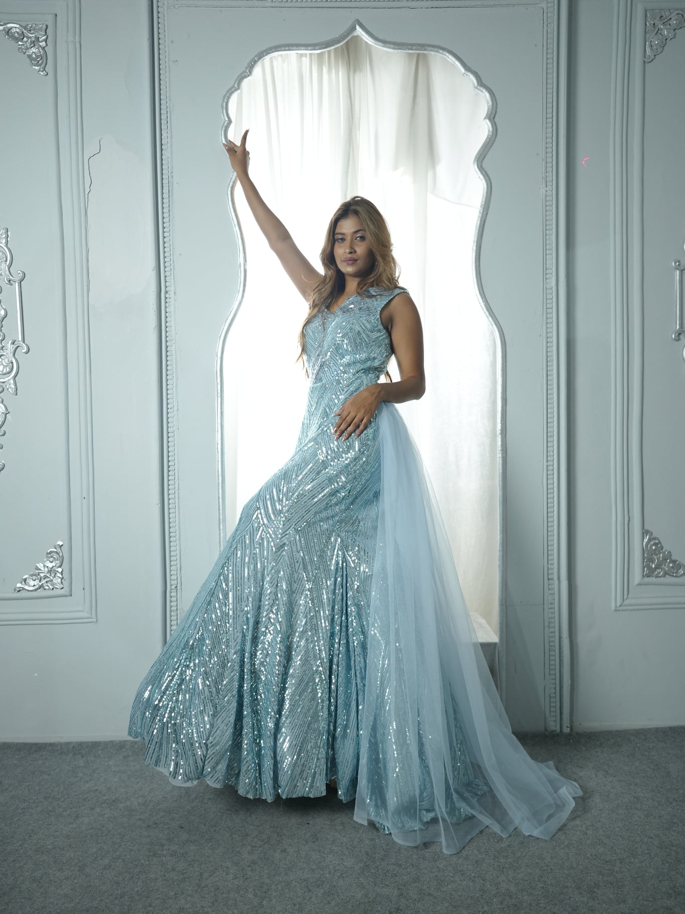 ASRAA - Embroidered Sky Blue Gown in net with sequins & cutdana work & Attached Drape.