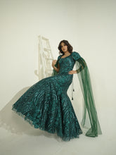 ELIZE- Emerald Green mermaid cut Embroidered Gown in net with sequins & cutdana work.