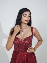 oliya - Embroidered red gown in net sequins & cutdana work.