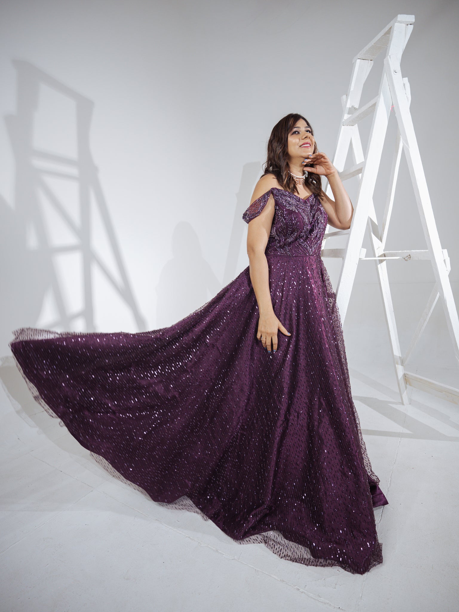 IZUUMI - Embroidered Purple Gown in net with sequins & cutdana work.