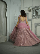 OSAA-Embroidered Peach Gown in net with sequins & cutdana work .