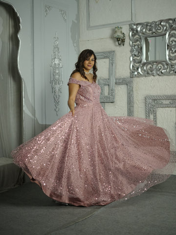 OSAA-Embroidered Peach Gown in net with sequins & cutdana work .