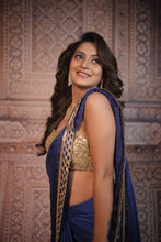 Navy Blue Beads and Diamond Embellished Border Saree In Satin Silk .