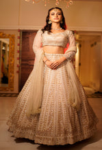 ITRH-  GOLDEN - Net Reception lehenga Embroidered with Pearls .