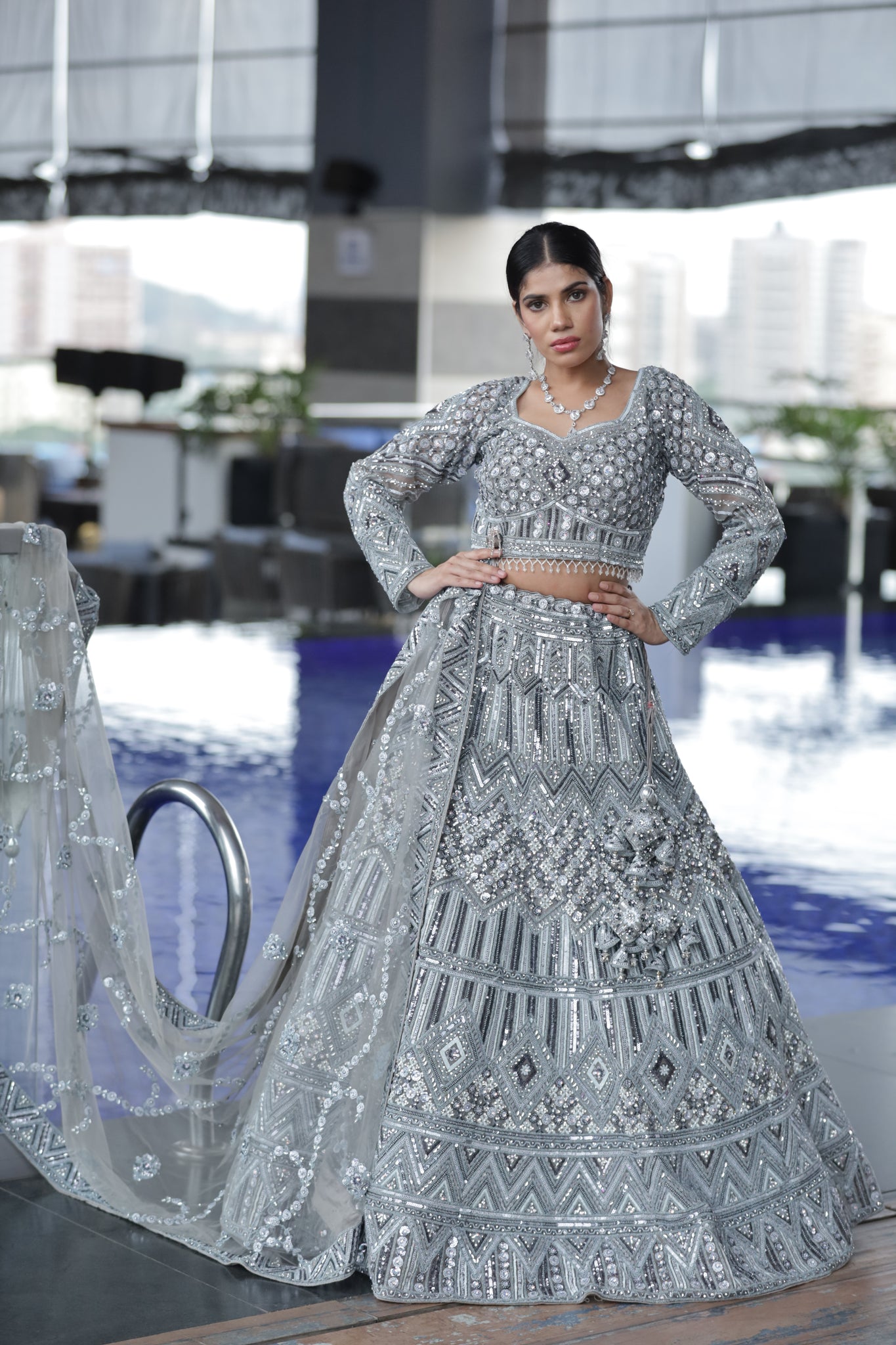 SAFAA- Net Gray Embroidered With Stone Sequins Reception lehenga.