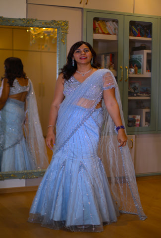 Ekaya Sky Blue  Net Handcrafted Fishcut Lehenga Saree Set .