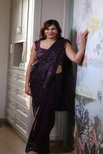 AGATA - Wine Net Saree  With Embrodered Blouse.