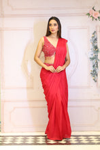 Description:-Red ready drape saree with Matching sequin blouse.