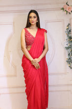 Description:-Red ready drape saree with Matching sequin blouse.