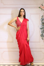 Description:-Red ready drape saree with Matching sequin blouse.