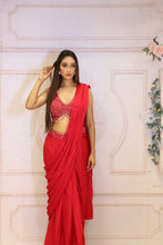 Description:-Red ready drape saree with Matching sequin blouse.