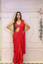 Description:-Red ready drape saree with Matching sequin blouse.