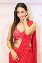 Description:-Red ready drape saree with Matching sequin blouse.