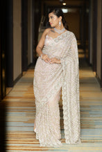 CLARA-Peach Net Hand Embroidered saree in stone work