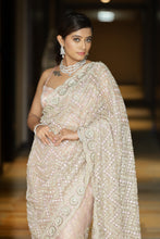 CLARA-Peach Net Hand Embroidered saree in stone work