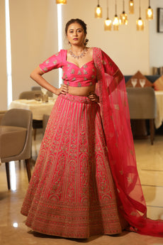 ROOP-VENETIAN Red raw silk lehenga with Aari ,sequins,thread work.