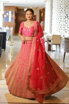 ROOP-VENETIAN Red raw silk lehenga with Aari ,sequins,thread work.