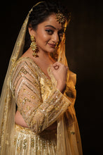 AISHA - GOLD Embroidered  Lehenga In Net With Sequins And Cutdana Work.