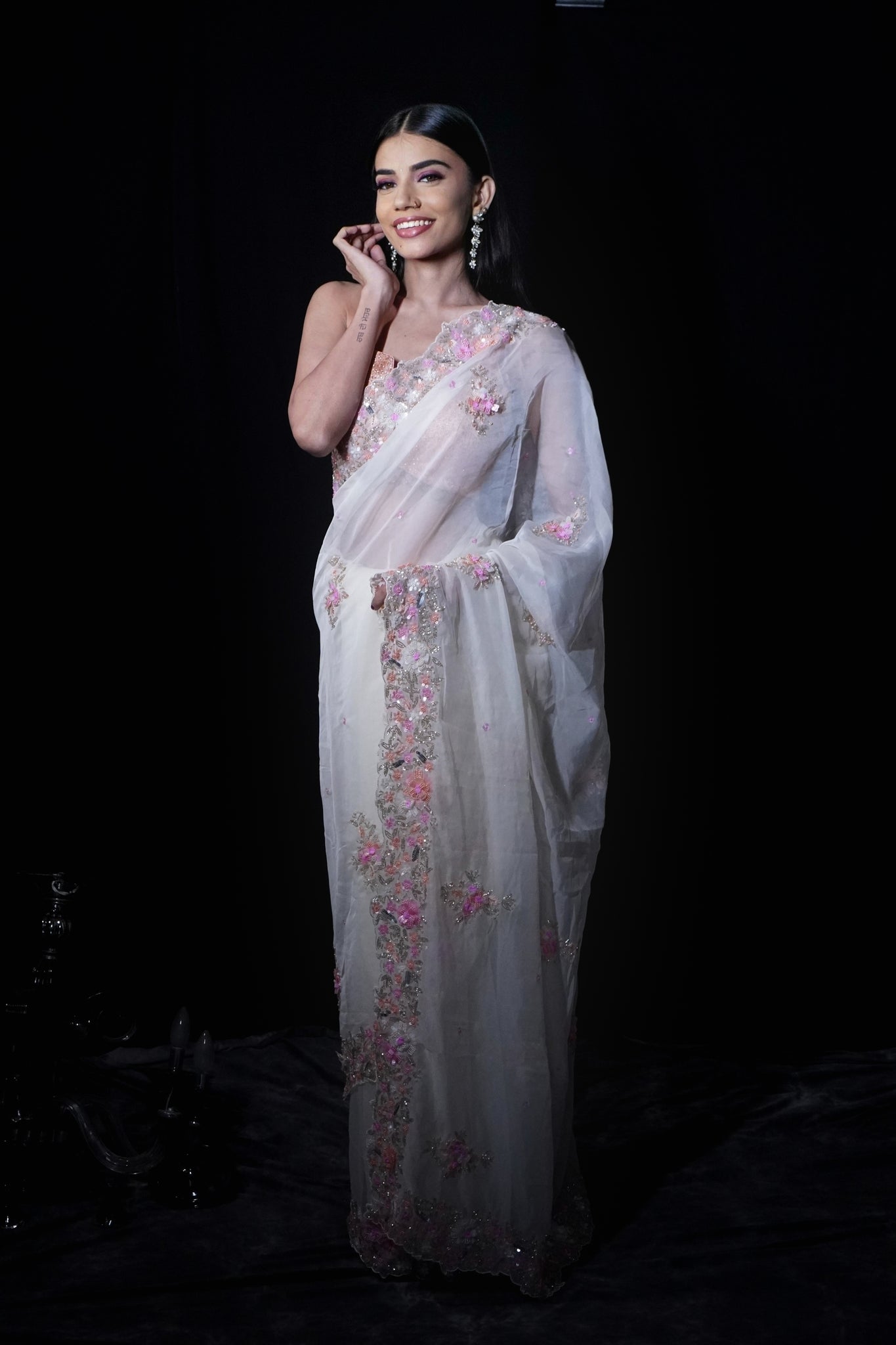 ANSHIKA-Powder White Saree In Organza With 3D Flower Embroidery Border And Buttis Featuring Multicolour Moti And Sequins