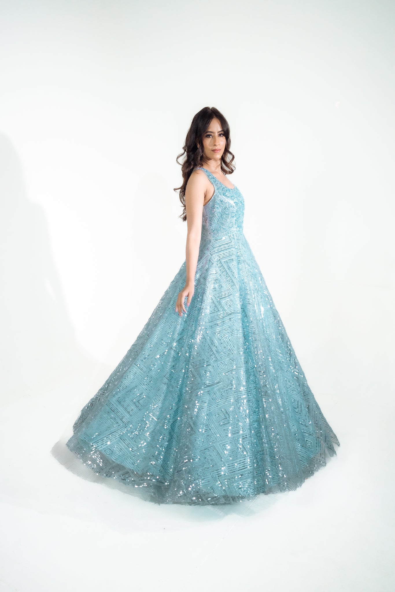 KASHMIRAA - Embroidered Sky Blue Gown  in net with sequins & cutdana work .