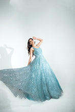 KASHMIRAA - Embroidered Sky Blue Gown  in net with sequins & cutdana work .