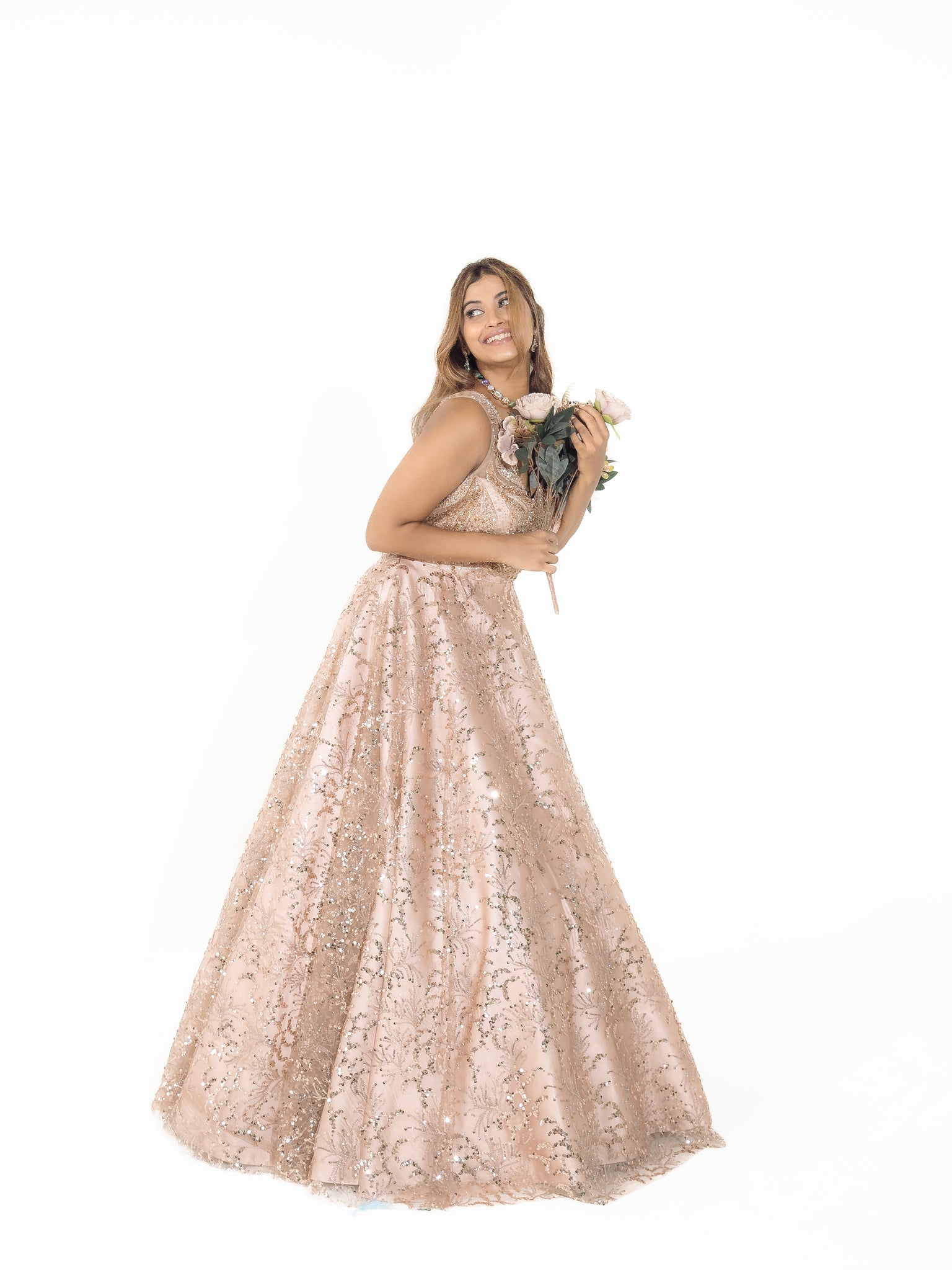 OSAA-Embroidered Peach Gown in net with sequins and cutdana work