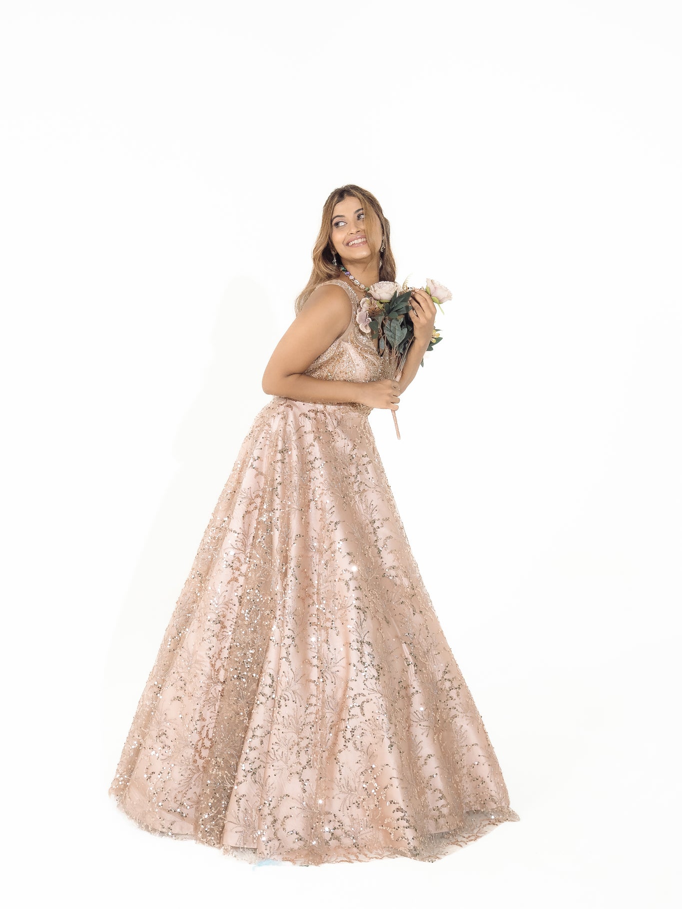 OSAA-Embroidered Peach Gown in net with sequins and cutdana work