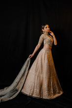 Golden net lehenga handcrafted in Sequin, pearl &amp; cutdana work with Matching blouse and Dupatta